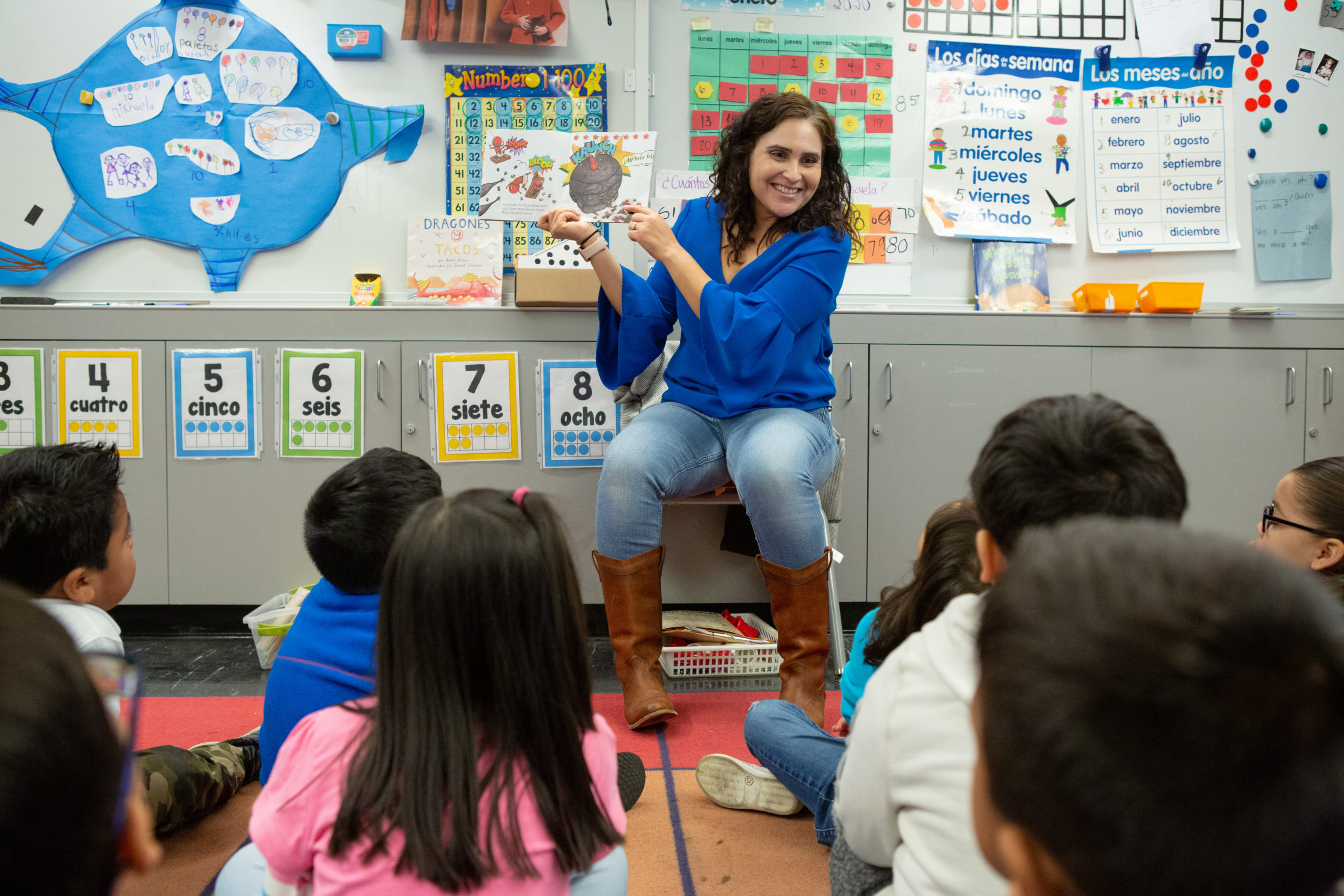 A teacher reads a story to her prekindergarten students at UCLA Community School.